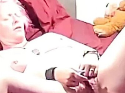 Horny milf kittienoone plays with her big natural tits and sex toy at home